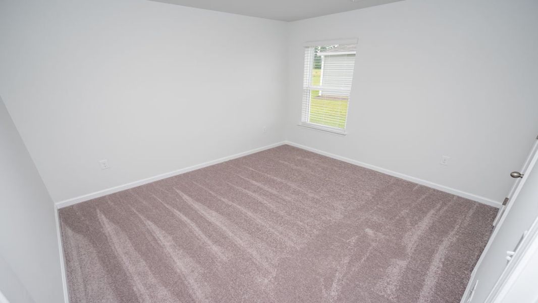 Representative unfurnished interior of a home built from the ARIA by D.R. Horton in The Meadows at Wildwood Village, Shallotte (Image 15). Representative unfurnished interior of a home built from the ARIA by D.R. Horton in The Meadows at Wildwood Village, Shallotte (Image 15).