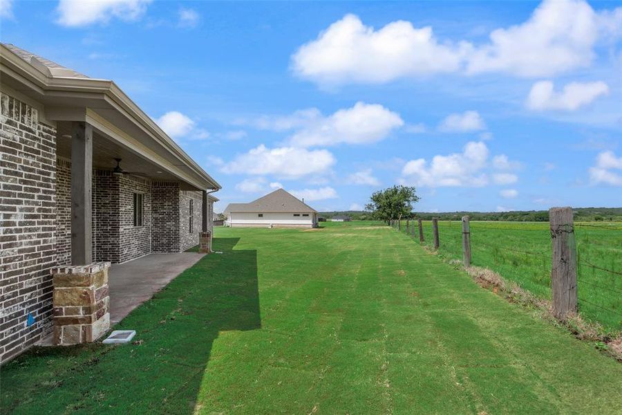 Exterior details and patio area of a home in , Glen Rose (Image 24). Exterior details and patio area of a home in , Glen Rose (Image 24).
