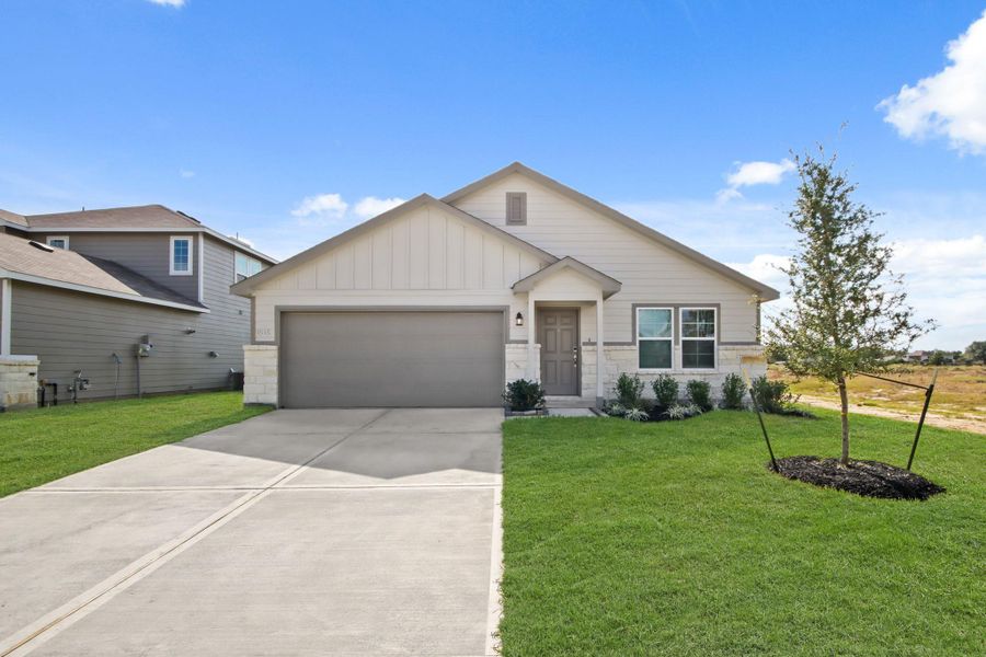 Front exterior of a new home in The Villages at Westpointe, Dayton, TX, highlighting curb appeal (Image 1). Front exterior of a new home in The Villages at Westpointe, Dayton, TX, highlighting curb appeal (Image 1).