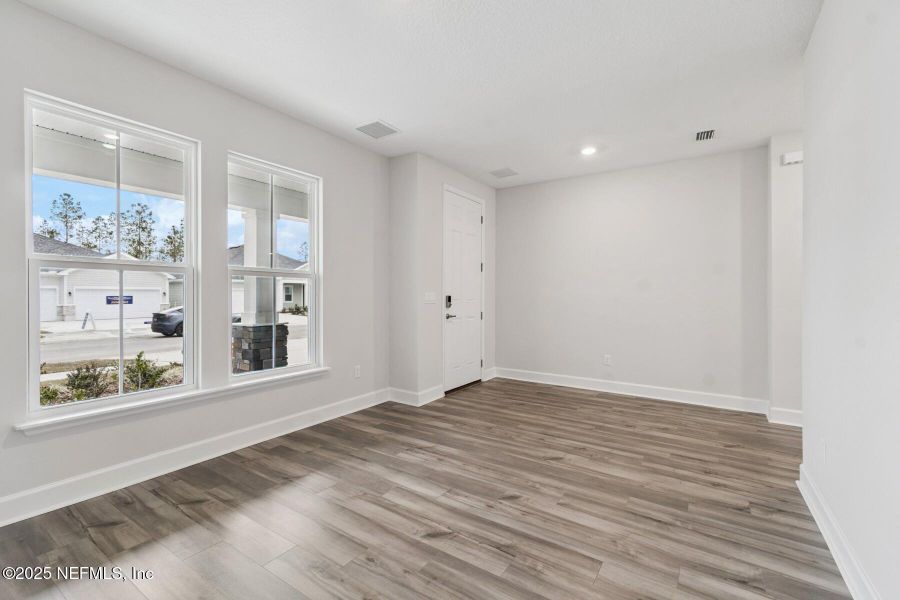 Spacious, unfurnished interior of a new home in Tributary 70', Yulee (Image 29).