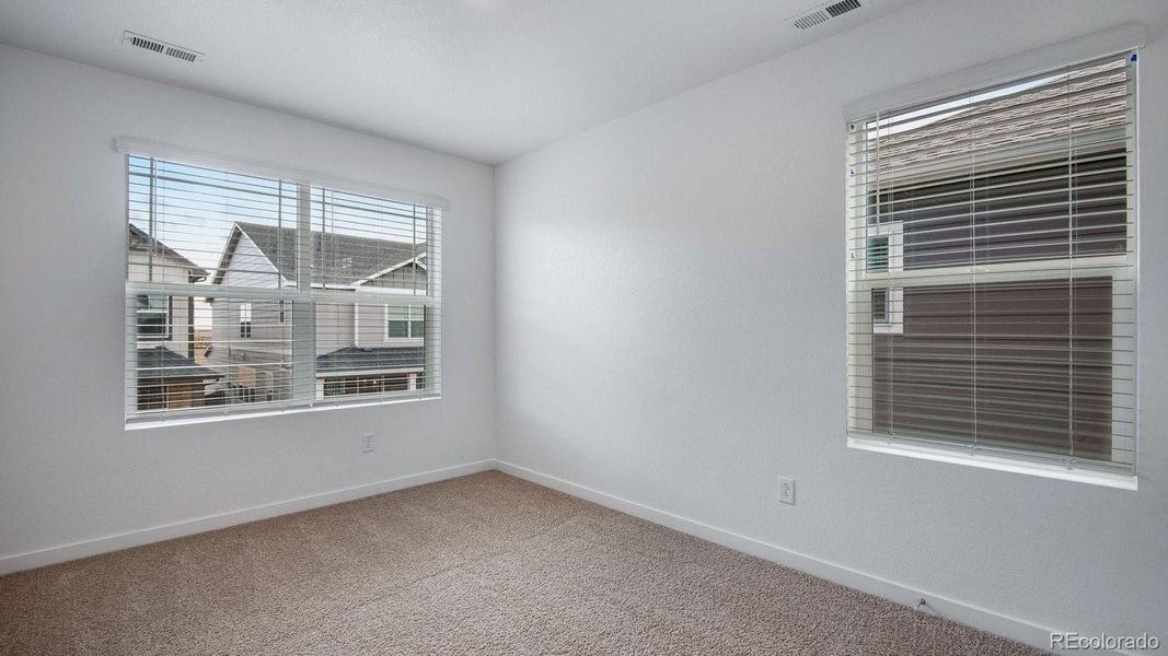 Spacious, unfurnished interior of a new home in Settlers Crossing, Commerce City (Image 20).