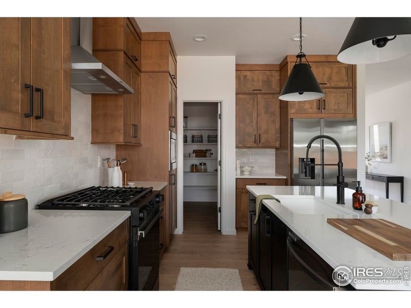 Furnished interior view inside a new home in Greenspire At Windsor Lake, Windsor (Image 32).