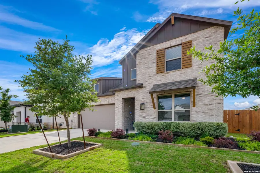Front exterior of a new home in Meyer Ranch, New Braunfels, TX, highlighting curb appeal (Image 22).