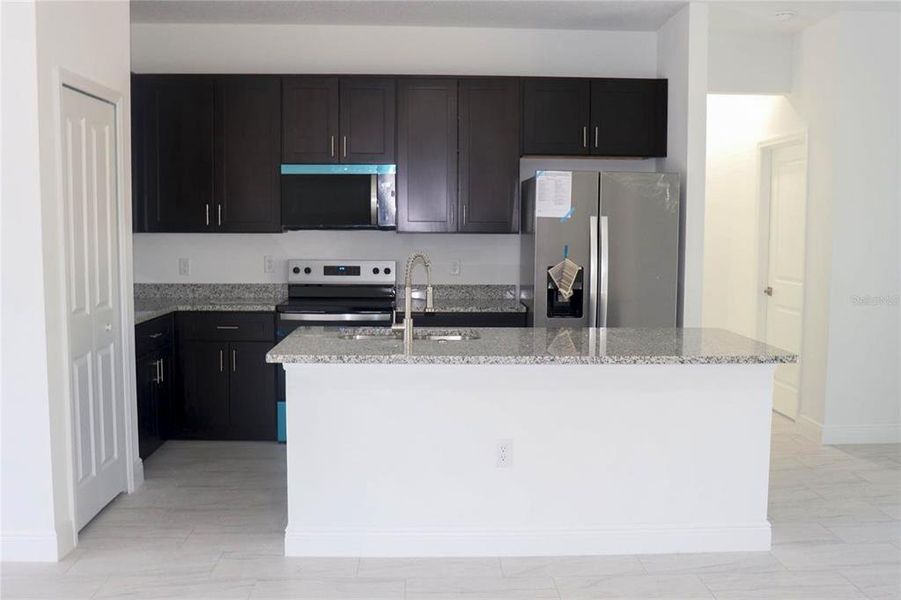 Furnished interior view inside a new home in , Citrus Springs (Image 11).
