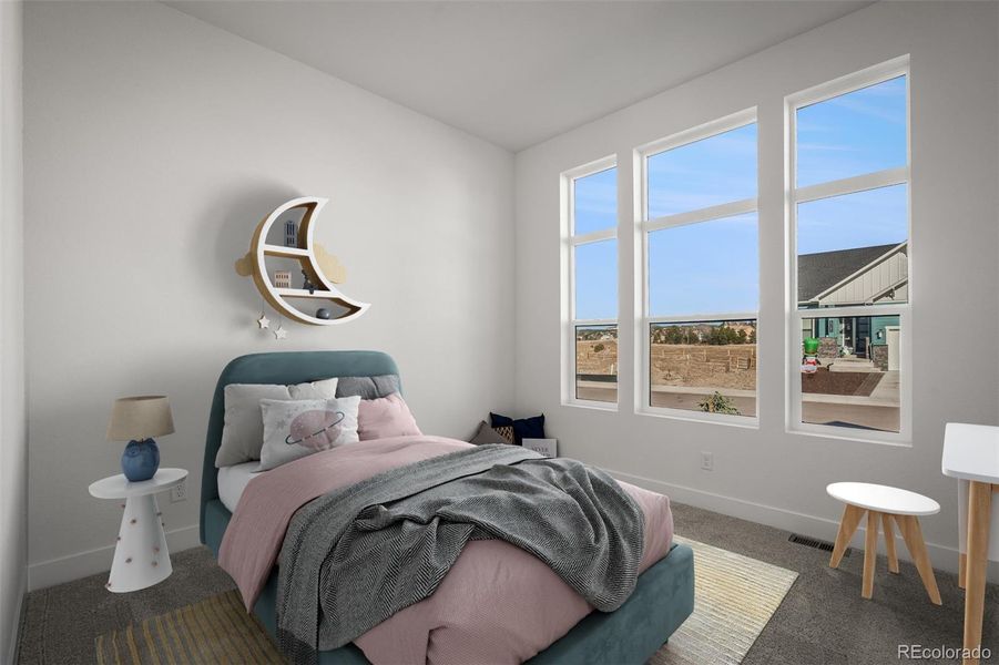 Furnished interior view inside a new home in Cloverleaf - Pinnacle Collection, Monument (Image 13).