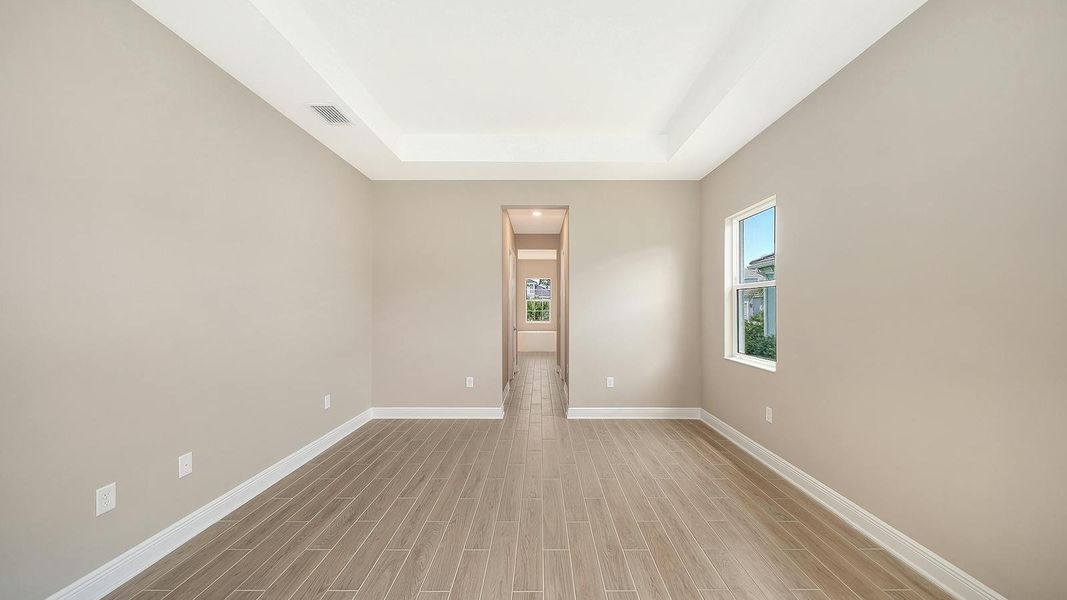 Spacious, unfurnished interior of a new home in Grand Park Real Estate and Homes for Sale in Sarasota, FL - Neal Communities, Sarasota (Image 33). Spacious, unfurnished interior of a new home in Grand Park Real Estate and Homes for Sale in Sarasota, FL - Neal Communities, Sarasota (Image 33).