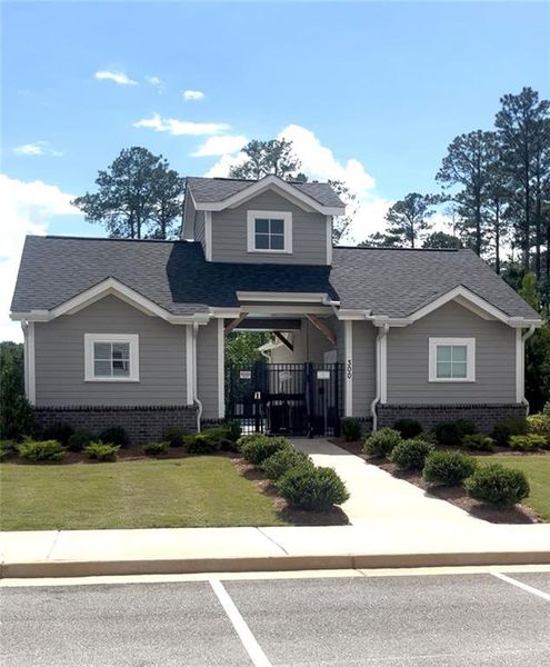Front exterior of a new home in Anderson Point Estates, McDonough, GA, highlighting curb appeal (Image 2).