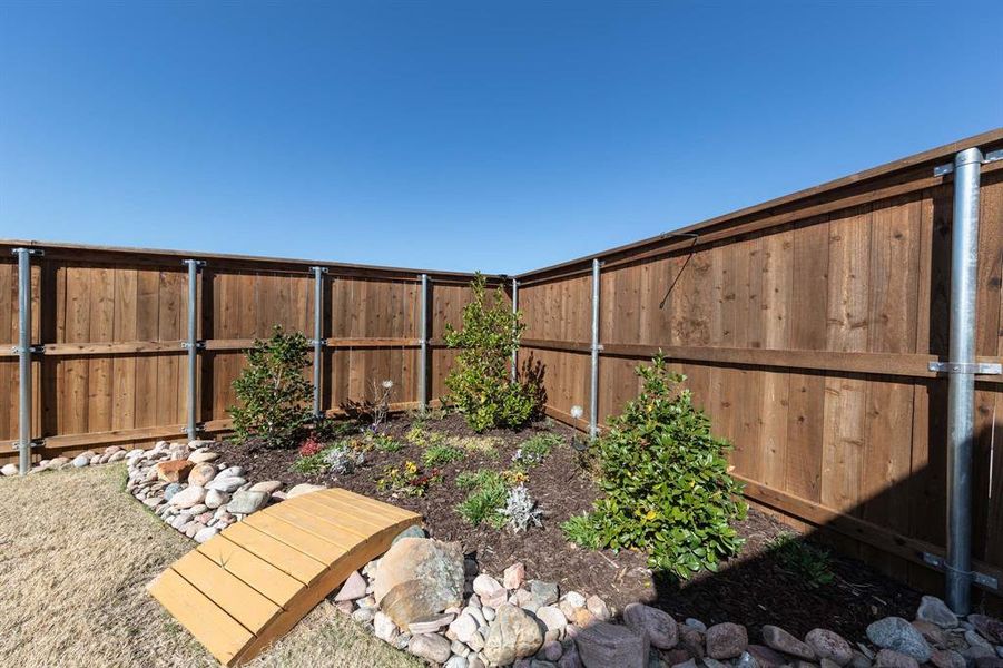 Exterior details and patio area of a home in , Denison (Image 27). Exterior details and patio area of a home in , Denison (Image 27).