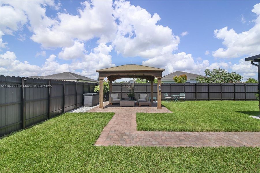 Front exterior of a new home in , Homestead, FL, highlighting curb appeal (Image 25).