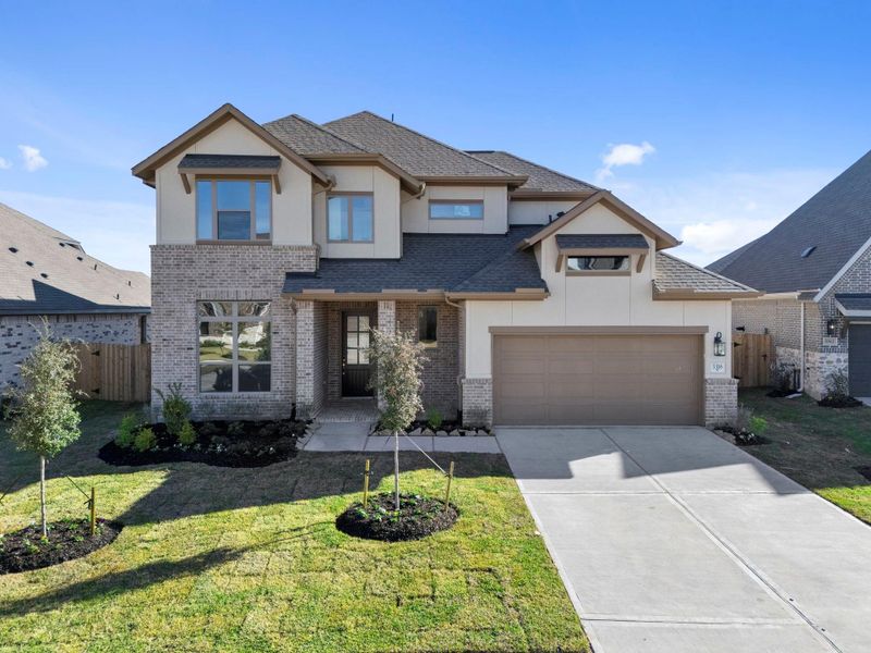 Front exterior of a new home in , Conroe, TX, highlighting curb appeal (Image 21). Front exterior of a new home in , Conroe, TX, highlighting curb appeal (Image 21).