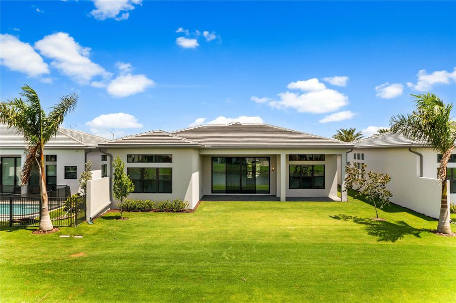 Front exterior of a new home in , Boca Raton, FL, highlighting curb appeal (Image 36). Front exterior of a new home in , Boca Raton, FL, highlighting curb appeal (Image 36).