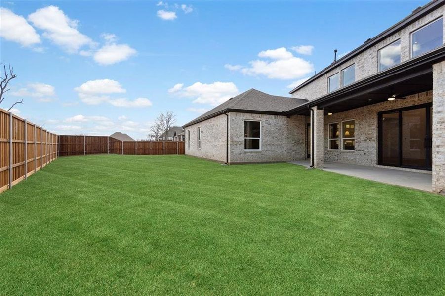 Exterior details and patio area of a home in , Denison (Image 28).