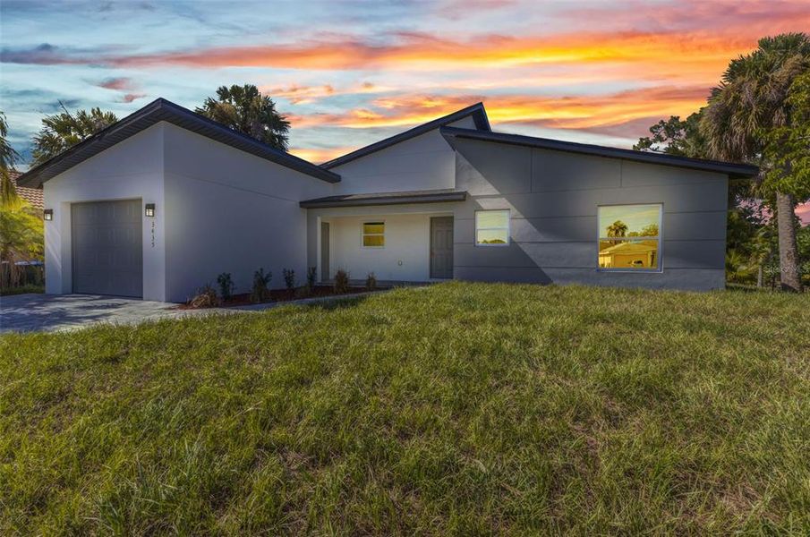 Front exterior of a new home in , North Port, FL, highlighting curb appeal (Image 23).
