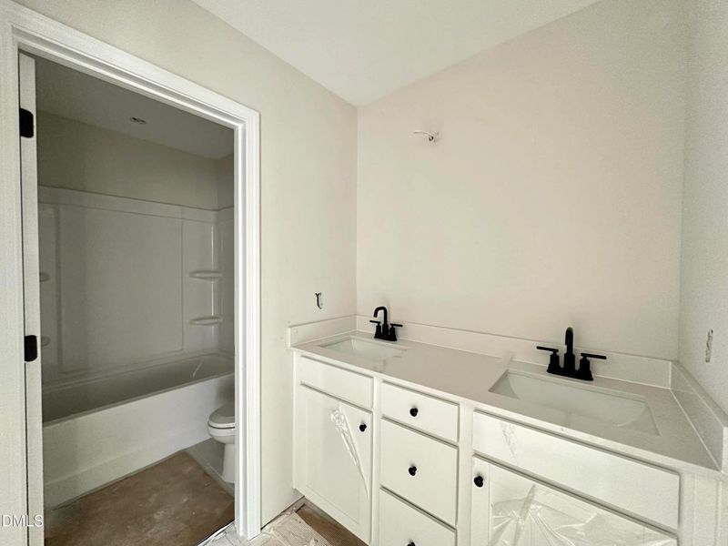 In-progress construction of a new home in Forestville Yard Townhomes, Knightdale, NC (Image 18).