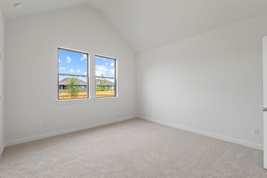 Primary Bedroom in the Pearl home plan by Trophy Signature Homes – REPRESENTATIVE PHOTO