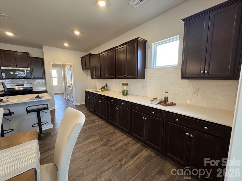 Furnished interior view inside a new home in McFarland Estates, York (Image 10).