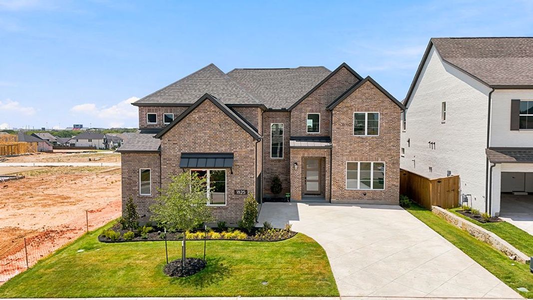 Front exterior of a new home in Furst Ranch, Argyle, TX, highlighting curb appeal (Image 26).