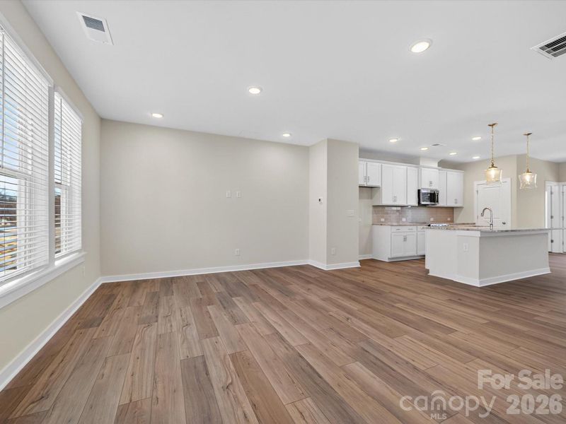 Spacious, unfurnished interior of a new home in Central Living at Craig, Charlotte (Image 15).