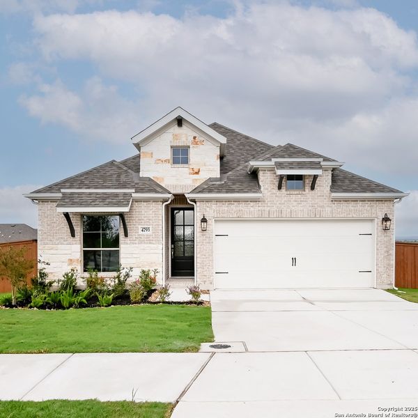 Front exterior of a new home in Homestead 55', Cibolo, TX, highlighting curb appeal (Image 25).