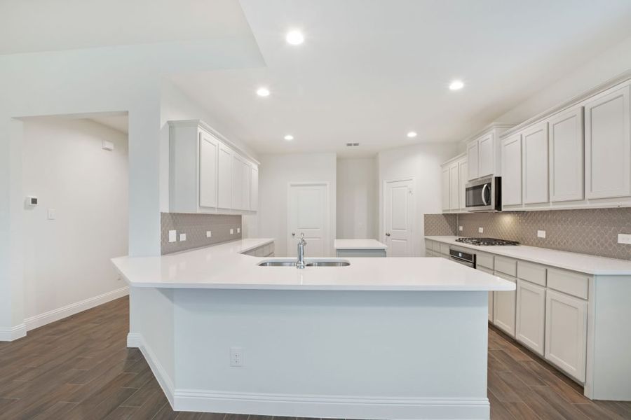 Representative exterior photo of a completed home built from the Preston by Impression Homes in Mercer Meadows, Royse City, TX (Image 5).