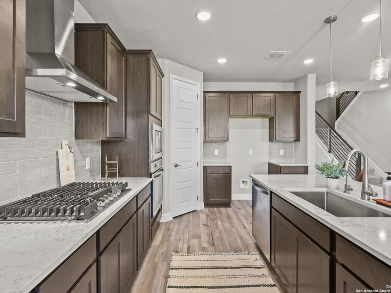 Furnished interior view inside a new home in The Reserve at Potranco Oaks, Castroville (Image 14).