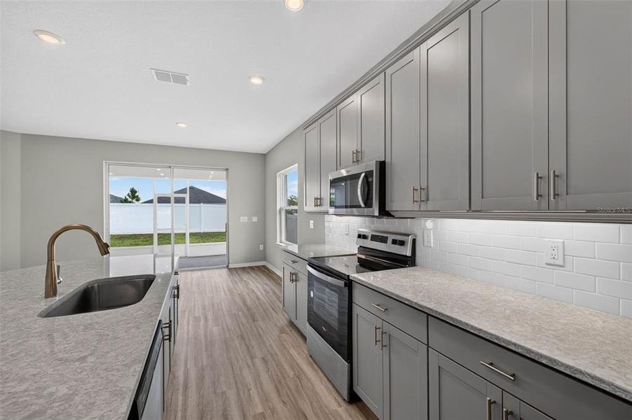 Furnished interior view inside a new home in , Davenport (Image 12).