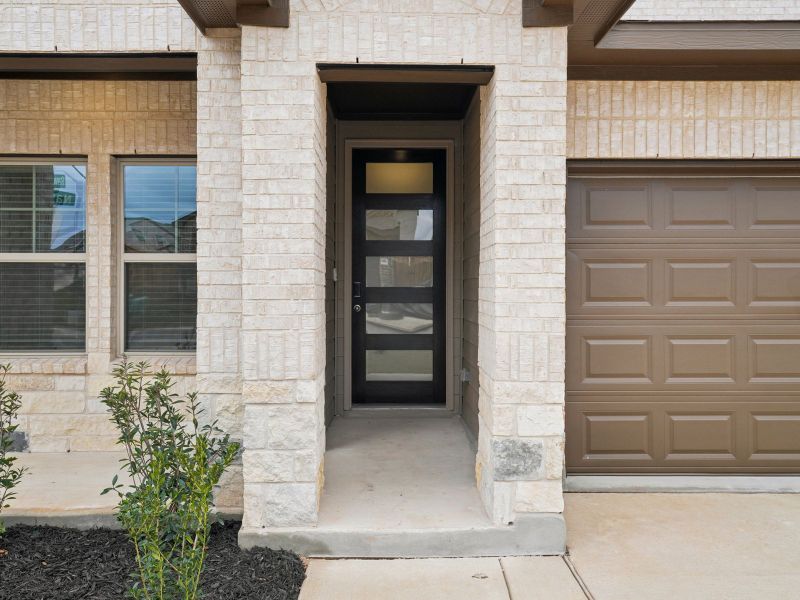 Exterior details and patio area of a home in Lark Canyon, New Braunfels (Image 3).