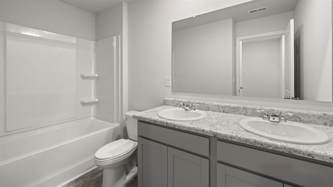 Furnished interior view inside a new home in Oaks at Cedar Grove, Fairburn (Image 11).