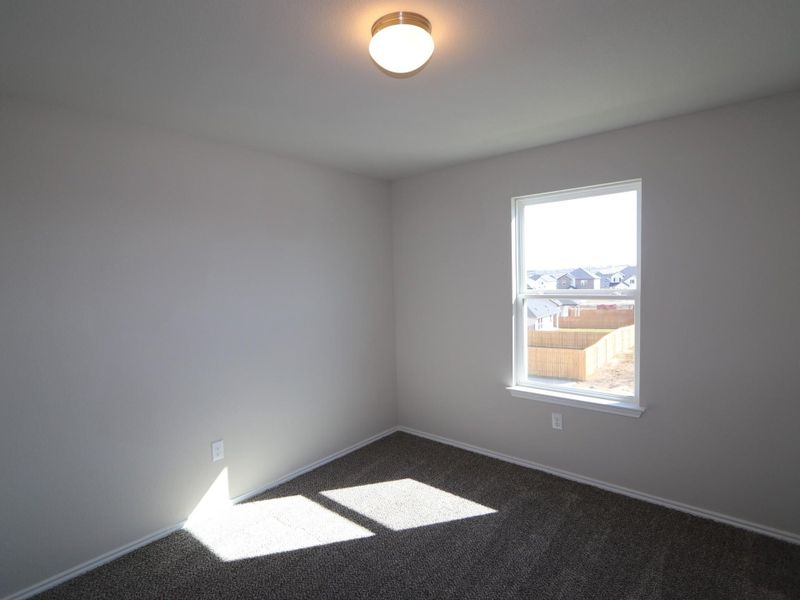 Spacious, unfurnished interior of a new home in Cascades at Onion Creek, Austin (Image 11).