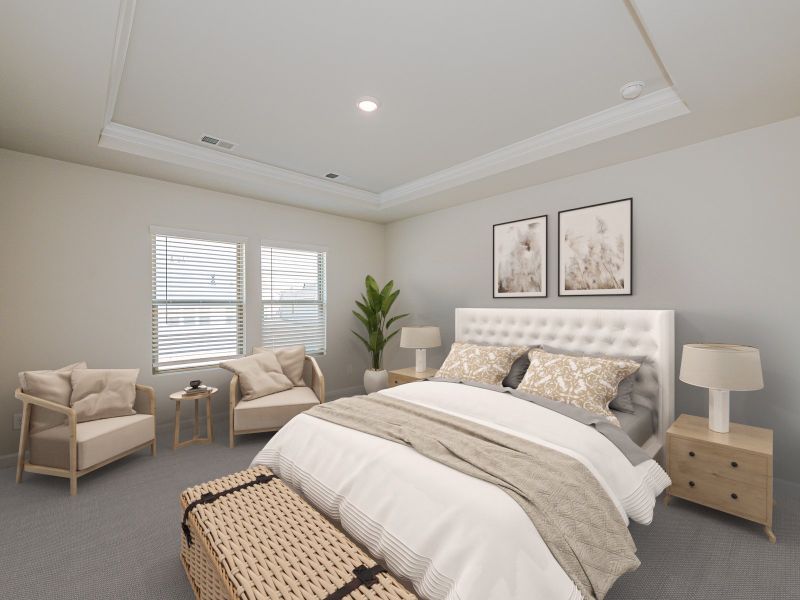 Enjoy unwinding from a long day in your plush primary suite.