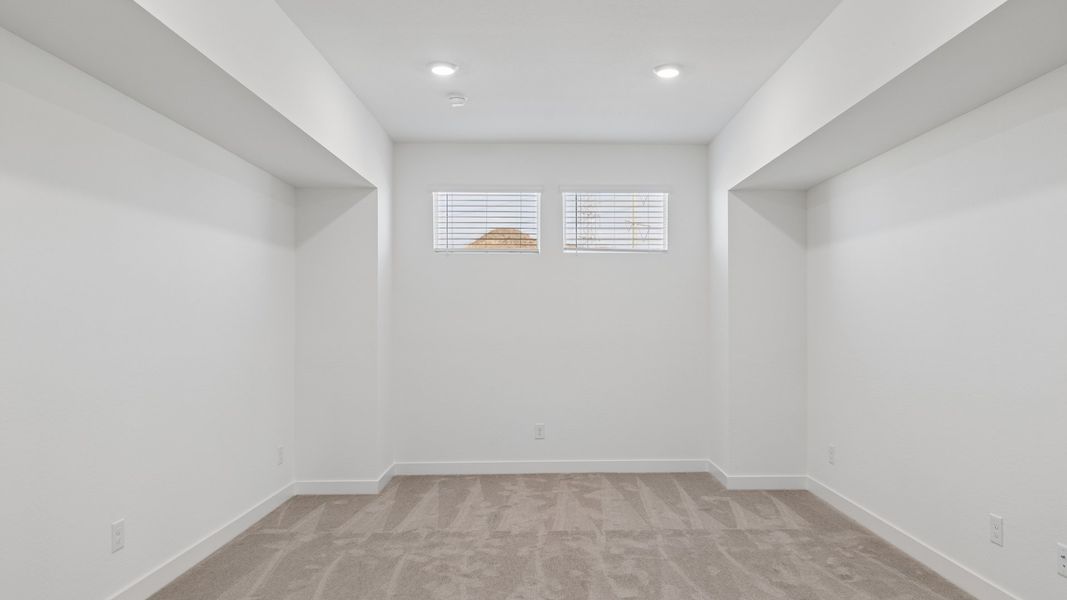 Representative unfurnished interior of a home built from the Phoenician by D.R. Horton in The Ridge at Stone Butte, Phoenix (Image 34).
