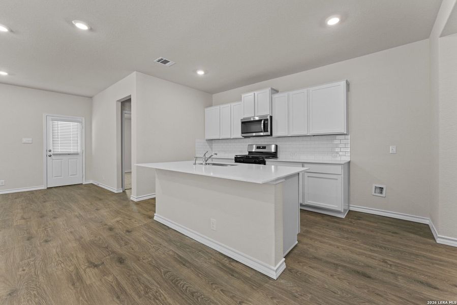 Furnished interior view inside a new home in Brookstone Creek, San Antonio (Image 4).