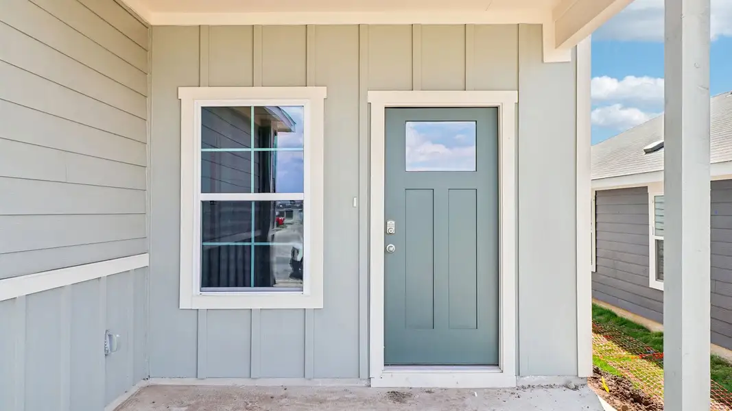 Exterior details and patio area of a home in Prairie Lakes, Buda (Image 3).