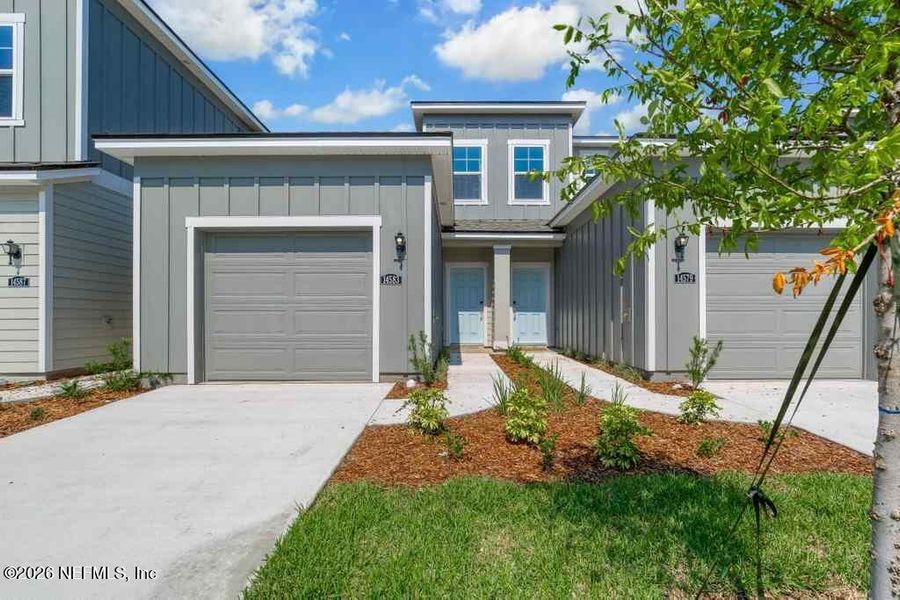 Front exterior of a new home in , Jacksonville, FL, highlighting curb appeal (Image 21).