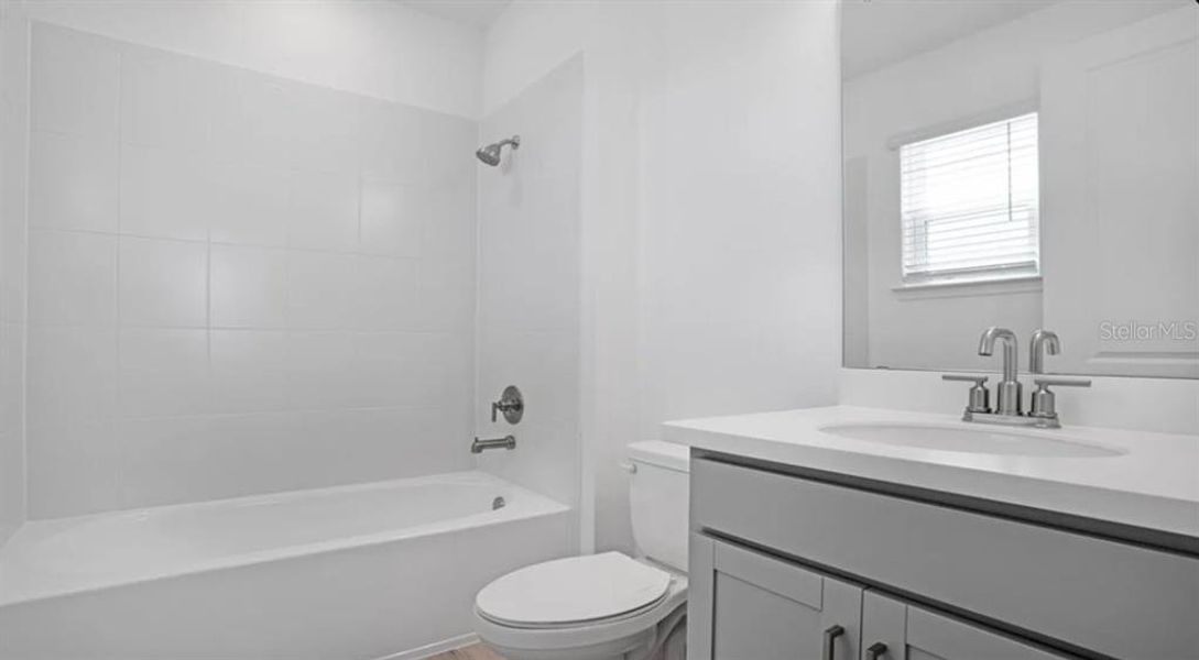 Furnished interior view inside a new home in Westview, Kissimmee (Image 9).