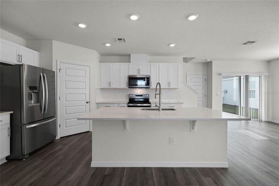 Furnished interior view inside a new home in Harmony at Lake Eloise, Winter Haven (Image 3). Furnished interior view inside a new home in Harmony at Lake Eloise, Winter Haven (Image 3).
