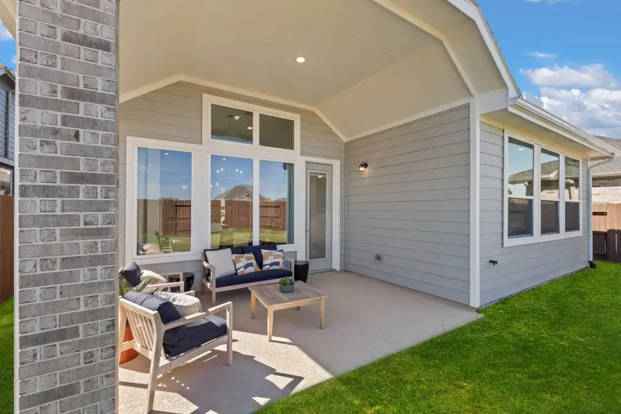 Exterior details and patio area of a home in Mulberry Farms, Santa Fe (Image 4). Exterior details and patio area of a home in Mulberry Farms, Santa Fe (Image 4).