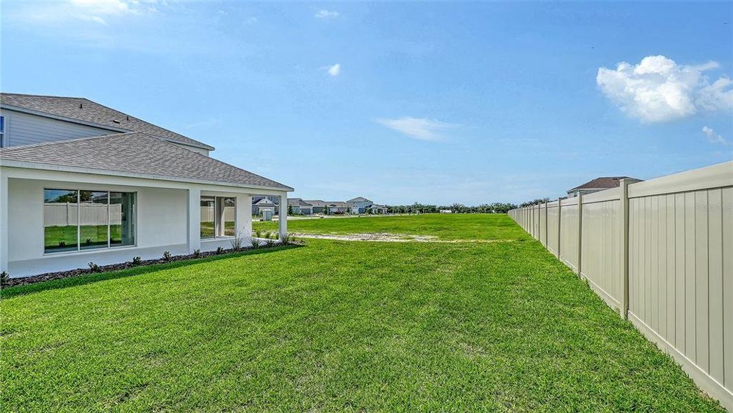 Exterior details and patio area of a home in Canoe Creek, Parrish (Image 20).