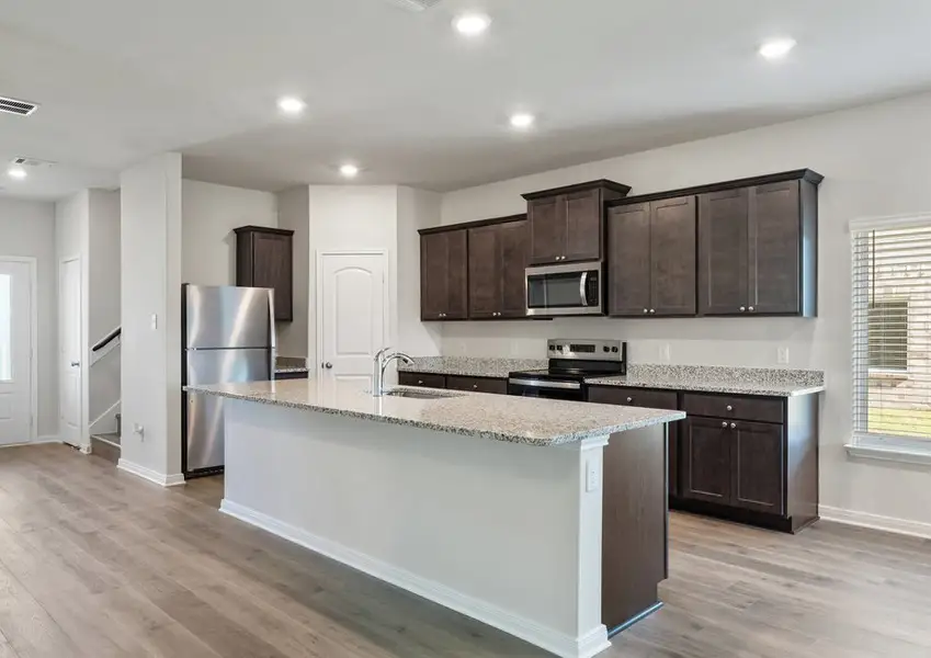 Representative furnished interior of a home built from the Bluebonnet by LGI Homes in Southaven, Hutchins (Image 3).