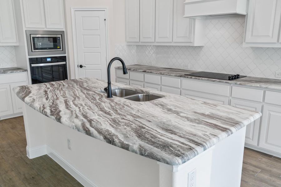 Kitchen | Concept 2796 at Coyote Crossing in Godley, TX by Landsea Homes