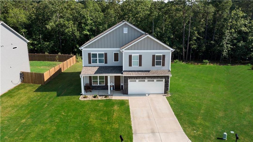 Front exterior of a new home in , Rome, GA, highlighting curb appeal (Image 18).