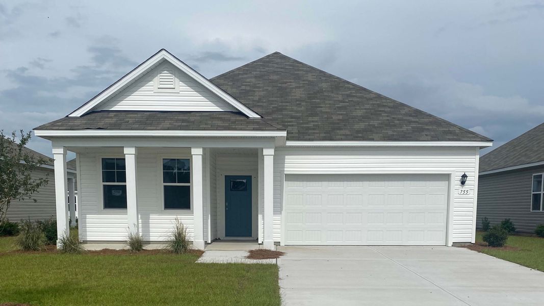 Front exterior of a new home in Stanbury Creek, Supply, NC, highlighting curb appeal (Image 1). Front exterior of a new home in Stanbury Creek, Supply, NC, highlighting curb appeal (Image 1).