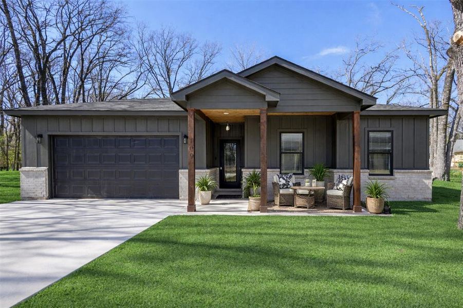 Front exterior of a new home in , Payne Springs, TX, highlighting curb appeal (Image 1). Front exterior of a new home in , Payne Springs, TX, highlighting curb appeal (Image 1).