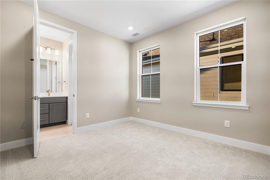 Spacious, unfurnished interior of a new home in Stargaze at Solstice, Littleton (Image 40).