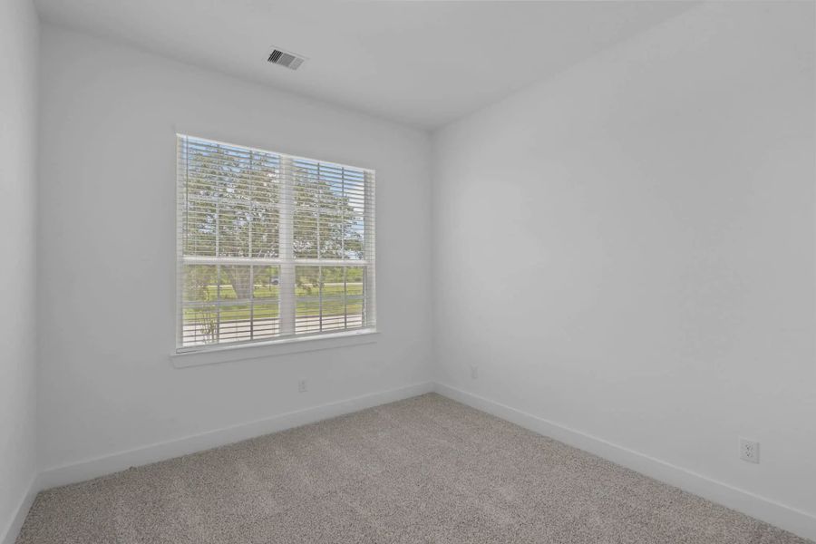 Representative unfurnished interior of a home built from the Mickelson by Chesmar Homes in Riceland Alley Loads, Mont Belvieu (Image 83).
