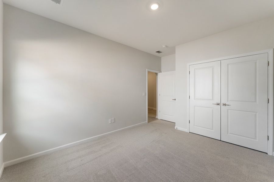 Spacious, unfurnished interior of a new home in Landing at Pine Lake, Anderson (Image 23).