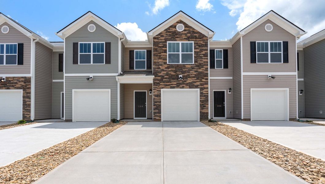 Front exterior of a new home in Brookside Ridge Townhomes, Greer, SC, highlighting curb appeal (Image 1). Front exterior of a new home in Brookside Ridge Townhomes, Greer, SC, highlighting curb appeal (Image 1).
