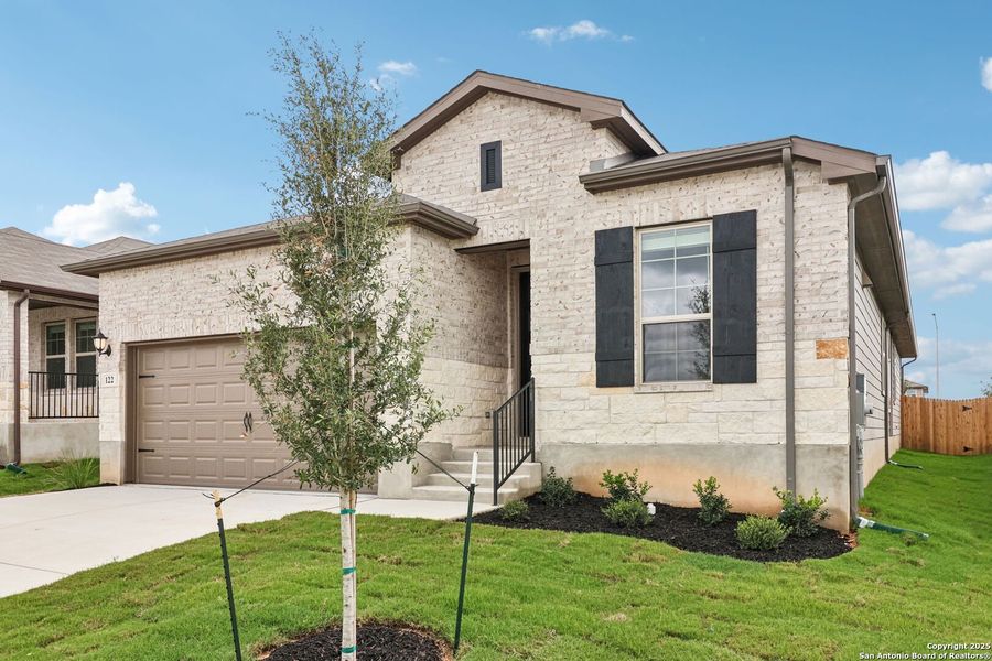 Front exterior of a new home in , Cibolo, TX, highlighting curb appeal (Image 20). Front exterior of a new home in , Cibolo, TX, highlighting curb appeal (Image 20).