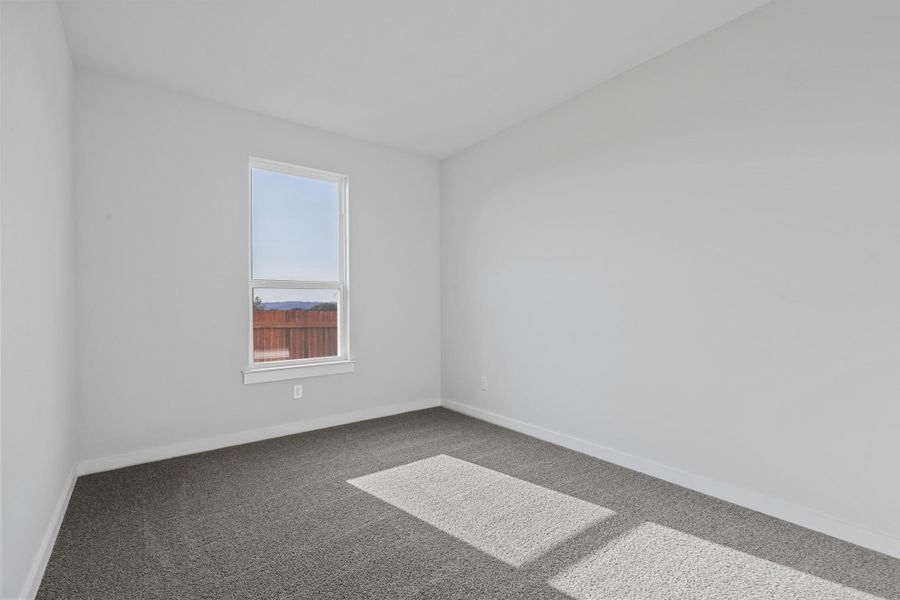 Representative unfurnished interior of a home built from the Garrison II by Cheldan Homes in Stoneview, Glen Rose (Image 59).