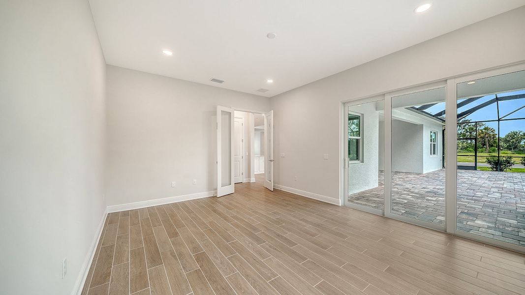 Spacious, unfurnished interior of a new home in Canoe Creek Real Estate and Homes for Sale in Parrish, FL - Neal Communities, Parrish (Image 40).